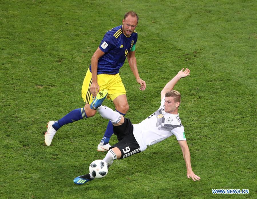 Timo Werner (bottom) of Germany vies with Andreas Granqvist of Sweden during the 2018 FIFA World Cup Group F match between Germany and Sweden in Sochi, Russia, June 23, 2018. (Xinhua/Ye Pingfan)