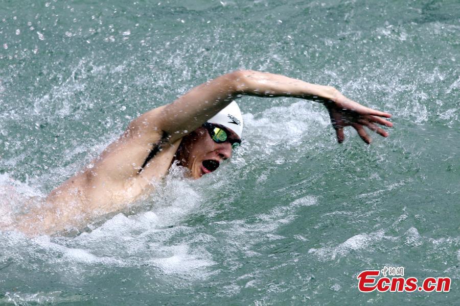 Participants compete in a swimming race across the Yellow River in Xunhua Salar Autonomous County, Northwest China’s Qinghai Province, June 24, 2018. The race on China’s second longest river was 500 meters long. (Photo: China News Service/Zhang Tianfu)