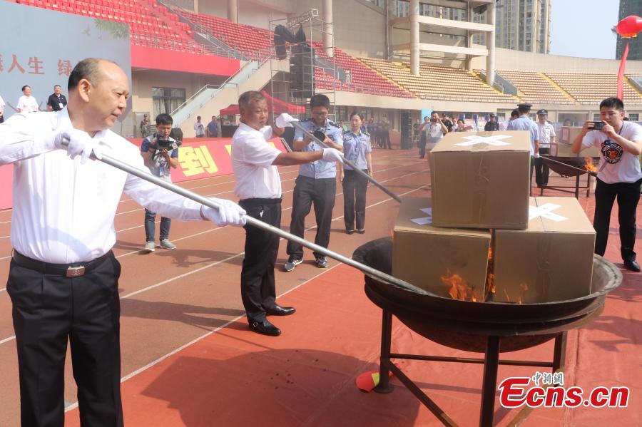 Police burn 297 kilograms of seized heroin, methamphetamine, morphine and other drugs in an event to mark the upcoming International Day Against Drug Abuse and Illicit Trafficking in Linquan County, East China’s Anhui Province, June 23, 2018. The United Nations\' International Day Against Drug Abuse and Illicit Trafficking falls on June 26 each year. (Photo: China News Service/Zhao Qiang)