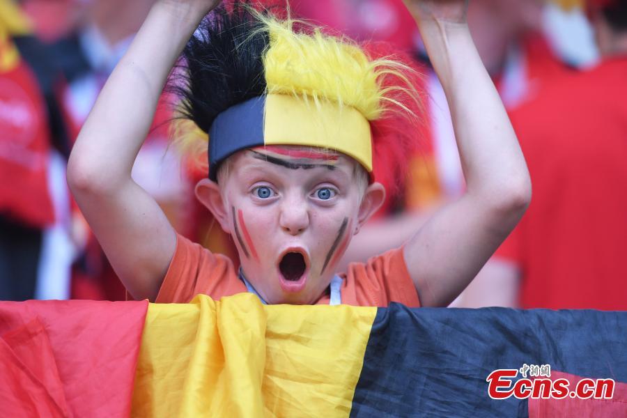 A Belgian fan celebrates during a World Cup match between Belgium and Tunisia in Spartak Stadium, Moscow, Russia, June 23, 2018. (Photo: China News Service/Tian Bochuan)