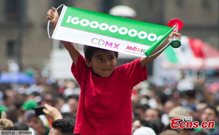 A Mexican boy reacts as he watches the World Cup match between Mexico and South Korea in Mexico City, June 23, 2018. (Photo/Agencies)