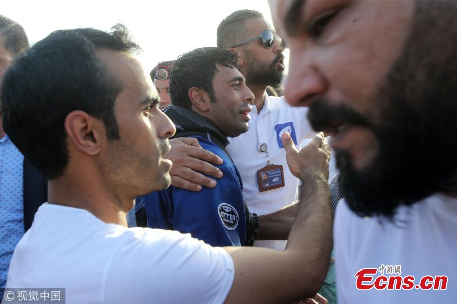 Adnan Nassrat returns from a successful 48-hour long dive on June 22, 2018 in Aqaba, Jordan. He seeks to break the Guinness World Record of six days under sea water next October. (Photo/Agencies)
