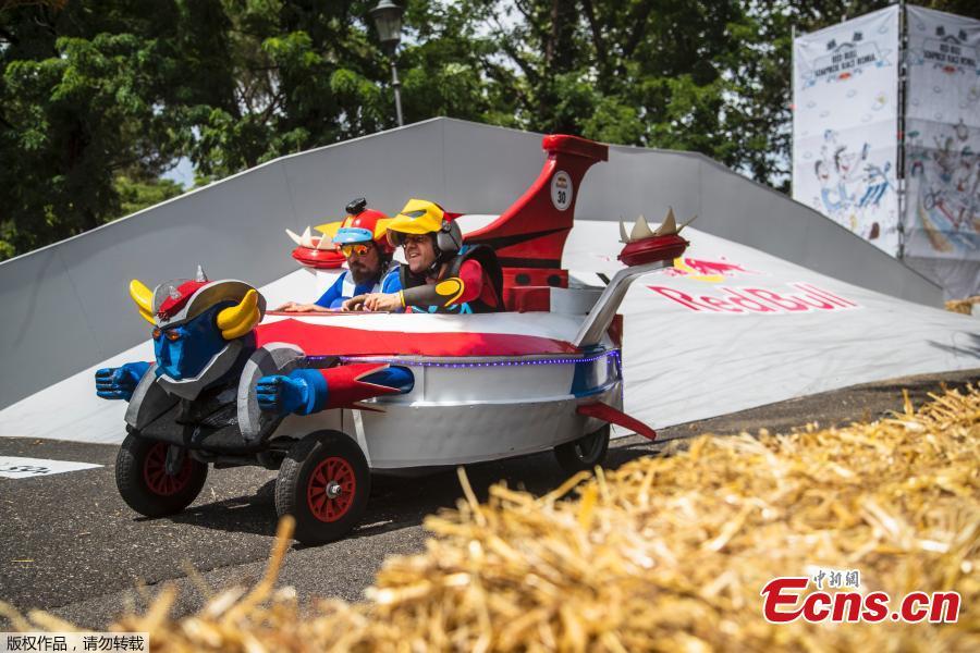 Competitors perform during the Red Bull Soapbox Race in Rome, Italy, June 24, 2018. Competitors enjoyed all kinds of twists and turns as the homemade vehicles sped down the storied slopes of The Eternal City. Red Bull Soapbox Race is an event for all those who love racing, have a sense of humor, and are interested in showing off their imagination and creativity. (Photo/Agencies)