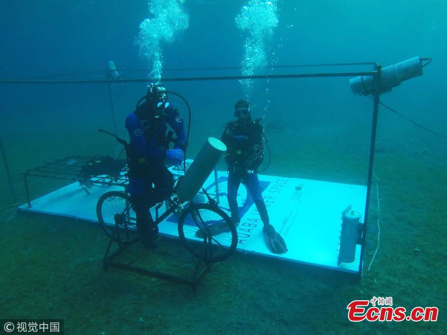 Adnan Nassrat attempts a 48-hour long dive on June 22, 2018 in Aqaba, Jordan. He seeks to break the Guinness World Record of six days under sea water next October. (Photo/Agencies)