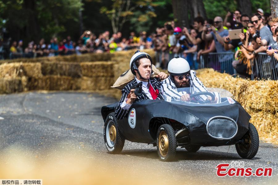 Competitors perform during the Red Bull Soapbox Race in Rome, Italy, June 24, 2018. Competitors enjoyed all kinds of twists and turns as the homemade vehicles sped down the storied slopes of The Eternal City. Red Bull Soapbox Race is an event for all those who love racing, have a sense of humor, and are interested in showing off their imagination and creativity. (Photo/Agencies)