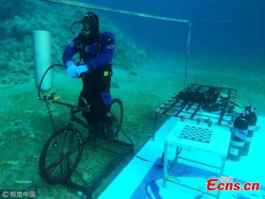 Adnan Nassrat attempts a 48-hour long dive on June 22, 2018 in Aqaba, Jordan. He seeks to break the Guinness World Record of six days under sea water next October. (Photo/Agencies)