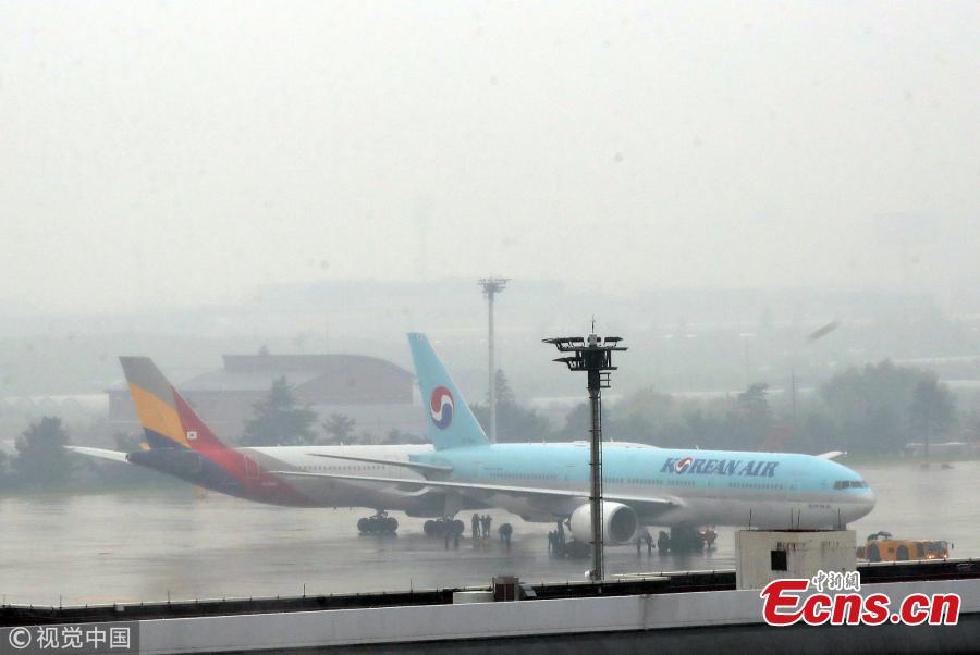 Two airplanes collide at an airport in Gimpo in western Seoul, causing damage to part of the jets, Juen 26, 2018. A passenger jet of the Korean Air, a flagship South Korean air carrier, hit its rear against a wing of the Asiana Airlines airliner. However, there has been no casualty. (Photo/VCG)