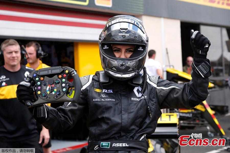 Aseel Al-Hamad of Saudi Arabia drives a Lotus Renault E20 Formula One car during a parade before the French Grand Prix in Circuit Paul Ricard, Le Castellet, France, June 24, 2018. Aseel Al-Hamad drove in front of thousands of fans on Sunday and declared the start of a new era for Saudi women in motorsport. “I believe today is not just celebrating the new era of women starting to drive, it’s also the birth of women in motorsport in Saudi Arabia,” she said. (Photo/Agencies)
