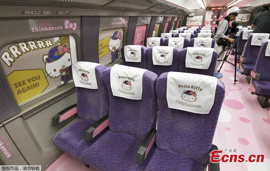 West Japan Railway Company unveils Hello Kitty Shinkansen, bullet train, at Hakata Railyard and Factory in Nakagawa-machi, Fukuoka Prefecture on June 25, 2018. It will travel between Shin-Osaka and Hakata station from June 30. Various kinds of Tourist Information will be offered at the first car and visitors can take picture with Kitty at the second.( Photo/Agencies)