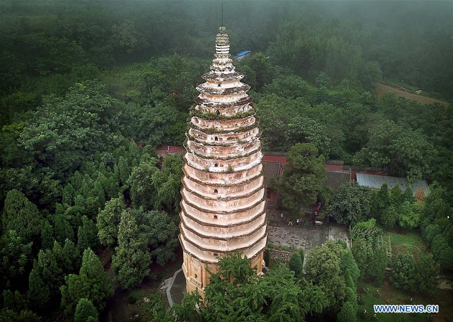 Photo taken on June 26, 2018 shows the Pagoda of the Songyue Temple in Dengfeng City, central China\'s Henan Province. The pagoda was built in the Northern Wei Dynasty (369-534). Pagodas built in ancient times in Henan act not only as landmarks for sight-seeing, but also as observers of the Chinese history. (Xinhua/Li An)