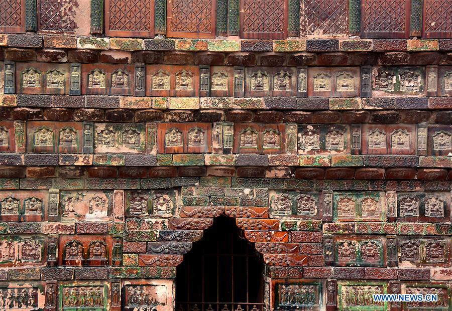 File photo taken on Sept. 6, 2014 shows carving on the \