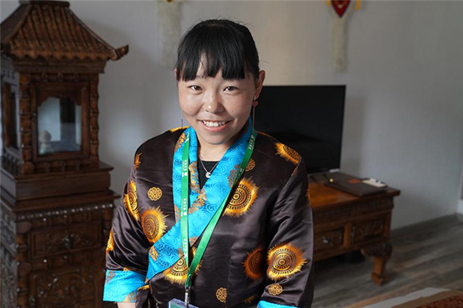 A homestay operator at Boma village in Lhasa, Tibet autonomous region, June 22, 2018. (Photo/Xinhua)


Lhasa is also a tourist city with more than 16 million tourists visiting every year and generating 22.7 billion yuan in income last year.

Some Tibetan people are taking advantage to start homestay business.

Now, people living in Boma, a relocation village that aims lift people from poverty, are building projects for tourists in Tibetan style.