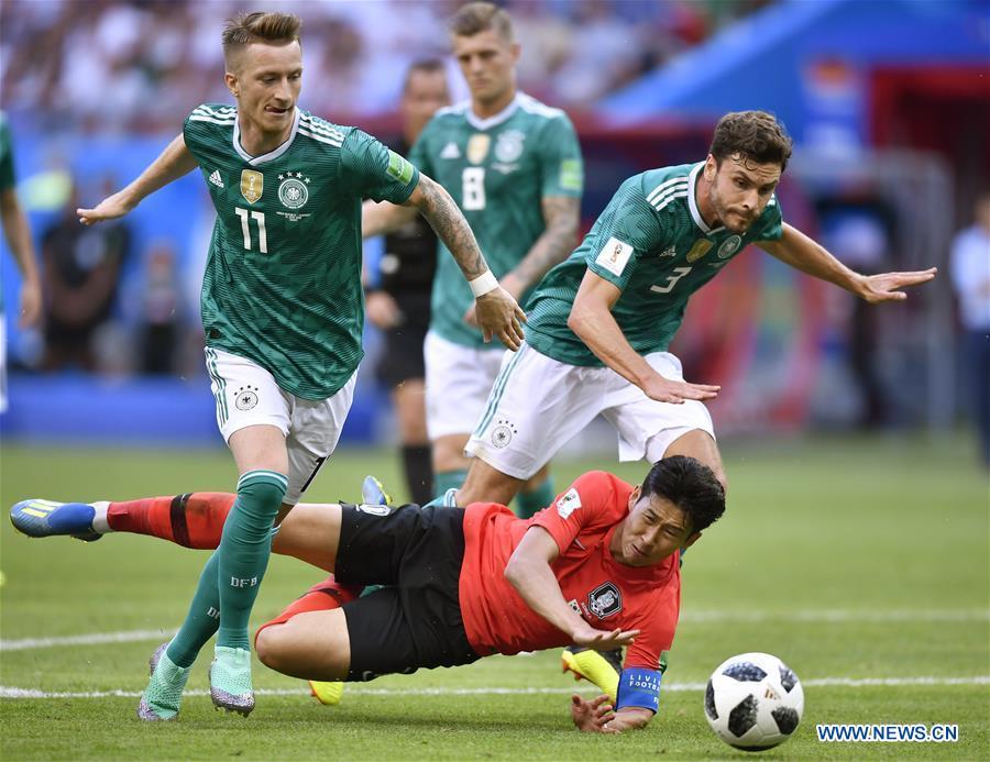Son Heungmin (bottom) of South Korea falls down during the 2018 FIFA World Cup Group F match between Germany and South Korea in Kazan, Russia, June 27, 2018. (Xinhua/Chen Yichen)
