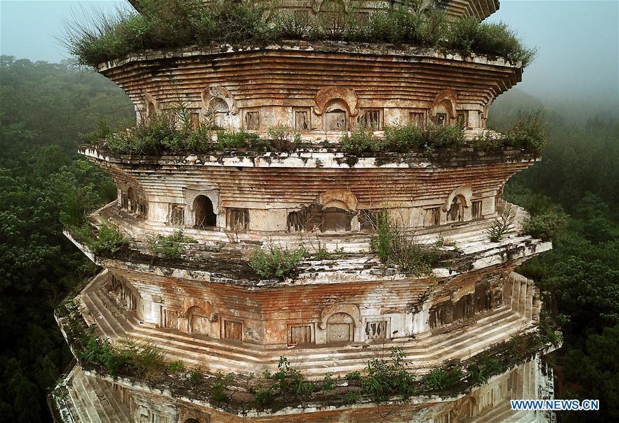 Photo taken on June 26, 2018 shows the Pagoda of the Songyue Temple in Dengfeng City, central China\'s Henan Province. The pagoda was built in the Northern Wei Dynasty (369-534). Pagodas built in ancient times in Henan act not only as landmarks for sight-seeing, but also as observers of the Chinese history. (Xinhua/Li An)