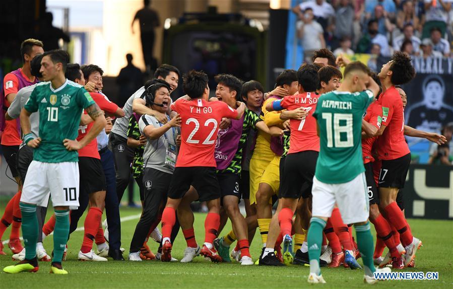 Players of South Korea celebrate after the referee confirmed a goal of South Korea valid after the Video Assistant Referee (VAR) review during the 2018 FIFA World Cup Group F match between Germany and South Korea in Kazan, Russia, June 27, 2018. South Korea won 2-0. (Xinhua/Li Ga)
