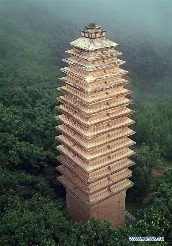Photo taken on June 26, 2018 shows the Pagoda of the Fawang Temple in Dengfeng City, central China\'s Henan Province. The pagoda was built in the Tang Dynasty (618-907). Pagodas built in ancient times in Henan act not only as landmarks for sight-seeing, but also as observers of the Chinese history. (Xinhua/Li An)