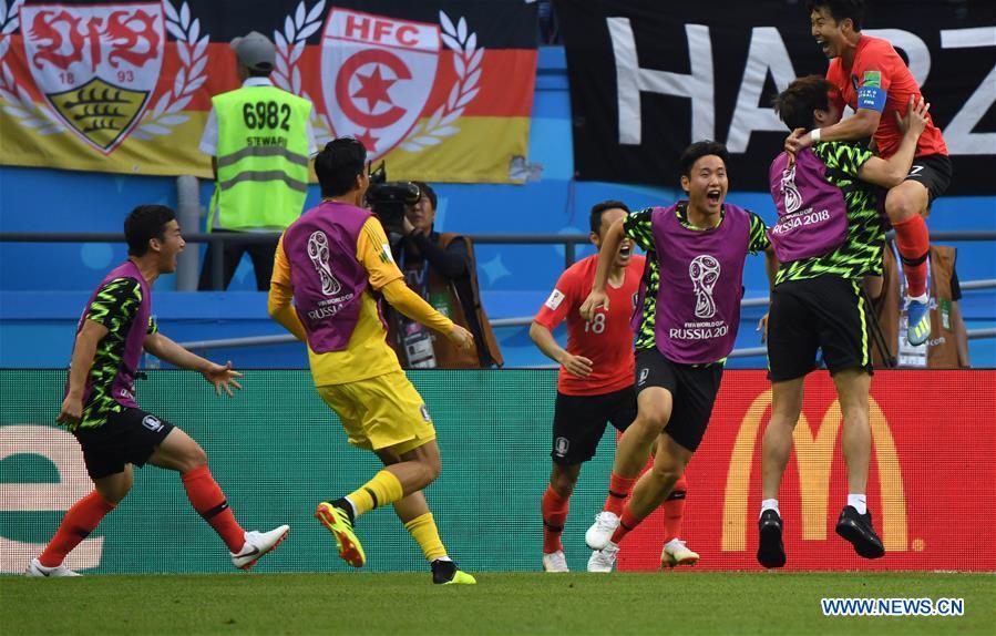 Players of South Korea celebrate scoring during the 2018 FIFA World Cup Group F match between Germany and South Korea in Kazan, Russia, June 27, 2018. South Korea won 2-0. (Xinhua/Li Ga)