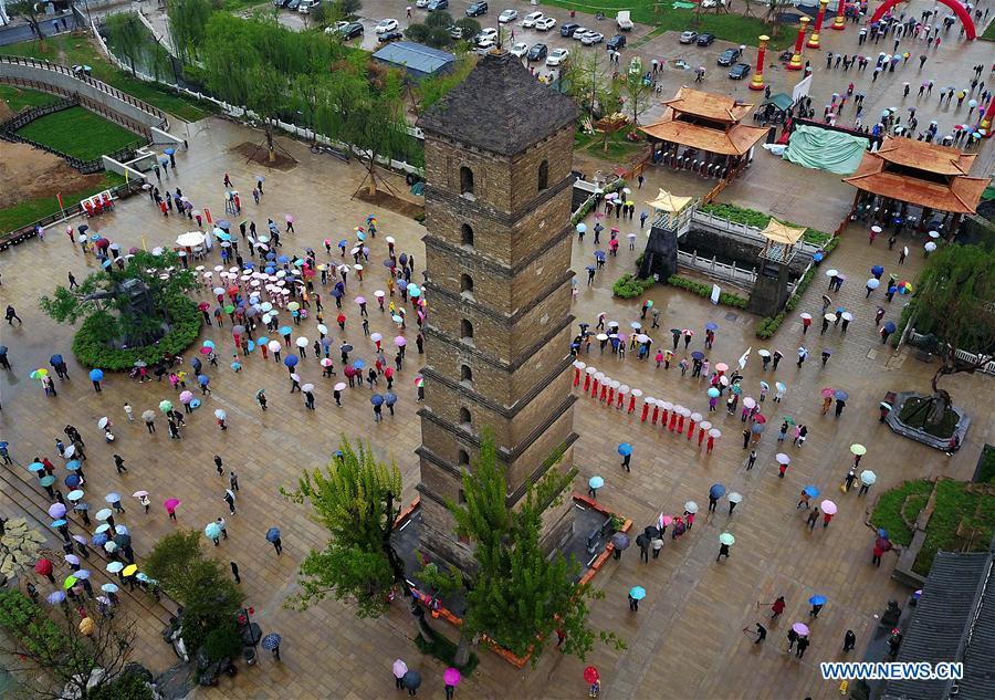File photo taken on April 10, 2017 shows the Wenfeng Pagoda in Luoyang, central China\'s Henan Province. The pagoda, first built in the Song Dynasty (960-1127) and destroyed at the end of the Ming Dynasty (1368-1644), was reconstructed in the Qing Dynasty (1644-1911). Pagodas built in ancient times in Henan act not only as landmarks for sight-seeing, but also as observers of the Chinese history. (Xinhua/Li An)