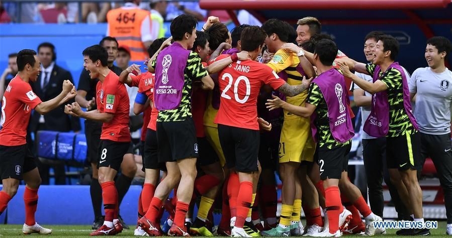 Players of South Korea celebrate scoring during the 2018 FIFA World Cup Group F match between Germany and South Korea in Kazan, Russia, June 27, 2018. South Korea won 2-0. (Xinhua/Chen Yichen)