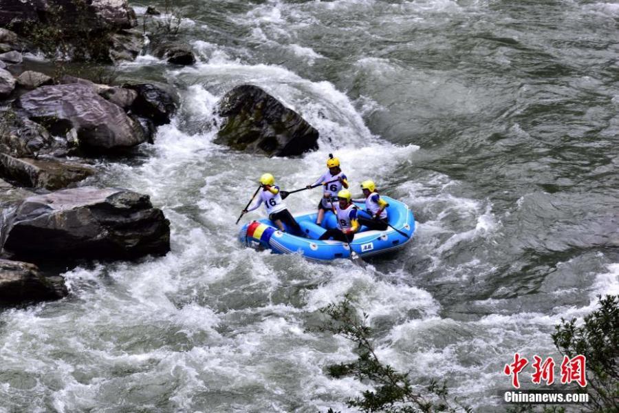 Participants ride down a river in an international rafting competition in Ziyuan County, Guilin City, South China’s Guangxi Zhuang Autonomous Region, June 28, 2018. Twenty teams from 16 countries including Argentina, Brazil and Nepal took part in the contest. (Photo: China News Service/Tang Mengxia)