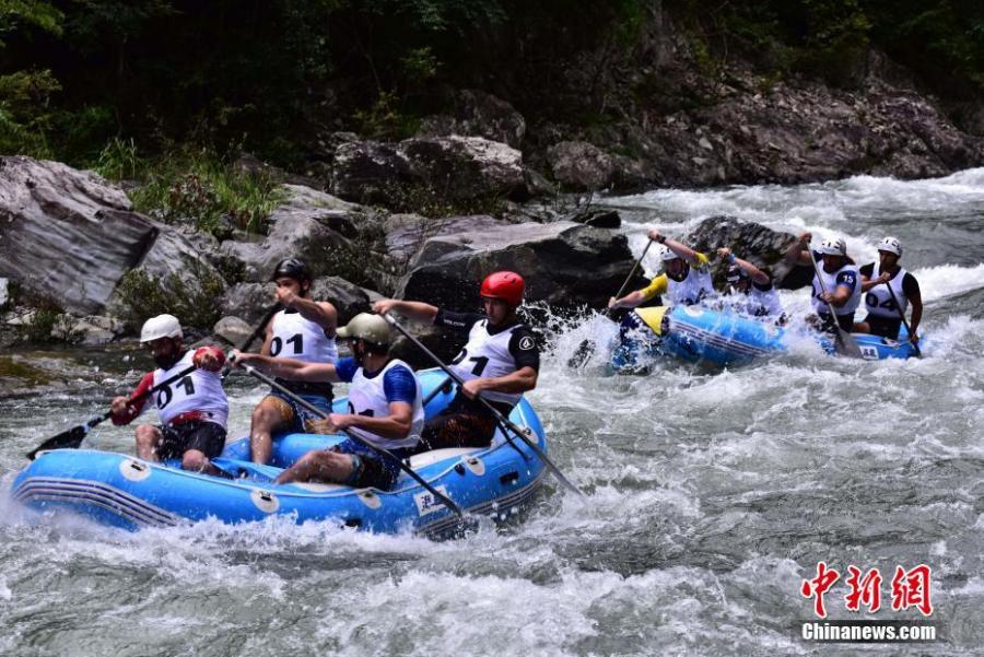 Participants ride down a river in an international rafting competition in Ziyuan County, Guilin City, South China’s Guangxi Zhuang Autonomous Region, June 28, 2018. Twenty teams from 16 countries including Argentina, Brazil and Nepal took part in the contest. (Photo: China News Service/Tang Mengxia)