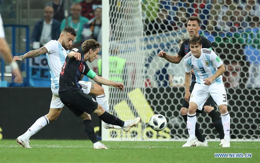 Luka Modric (2nd L) of Croatia shoots to score during the 2018 FIFA World Cup Group D match between Argentina and Croatia in Nizhny Novgorod, Russia, June 21, 2018. Croatia won 3-0. (Xinhua/Wu Zhuang)

Best goal

Yes, Argentina\'s defence has at times been dire in this tournament, but that should take nothing away from Luka Modric\'s spectacular goal for Croatia against the Albiceleste in Nizhny Novgorod. The Real Madrid midfielder dummied onto his left side before daintily shifting back to the right and curling a 30-yard strike into the top right corner, all but securing his team a place in the next stage.