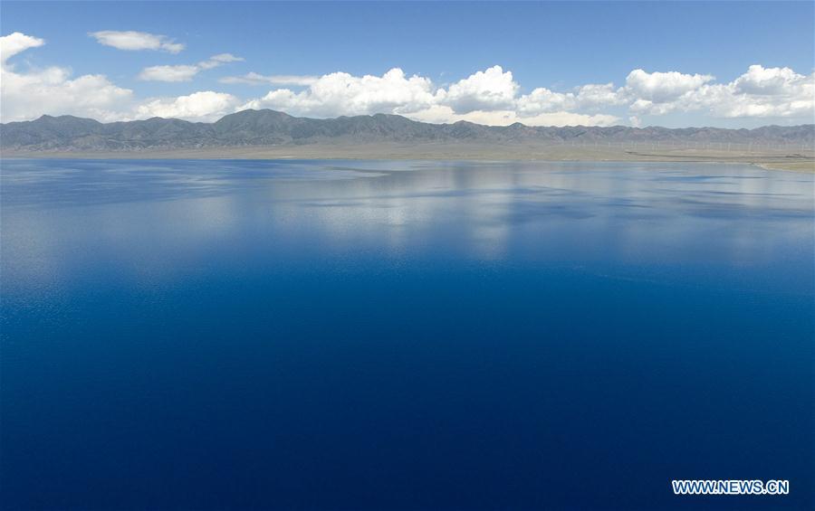 Aerial photo taken on June 29, 2018 shows the scenery of the Sayram Lake in northwest China\'s Xinjiang Uygur Autonomous Region. (Xinhua/Zhao Ge)