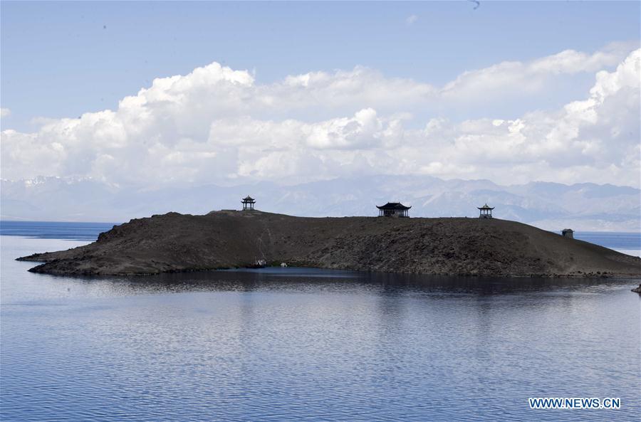 An island is seen on the Sayram Lake in northwest China\'s Xinjiang Uygur Autonomous Region, June 29, 2018. (Xinhua/Zhao Ge)