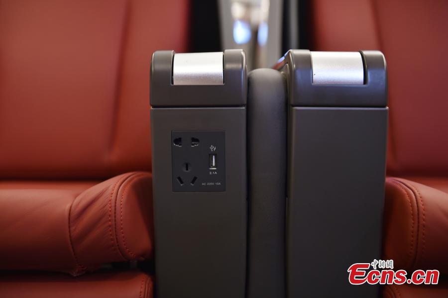 A view of the interior of the extended version of the Fuxing bullet train in Daxing District, Beijing. With a designed speed of 350 kilometers per hour, the new train is 414.26 meters long with 16 carriages, twice as many as the current Fuxing. It has 1,193 seats.  (Photo: China News Service/Zhai Lu)