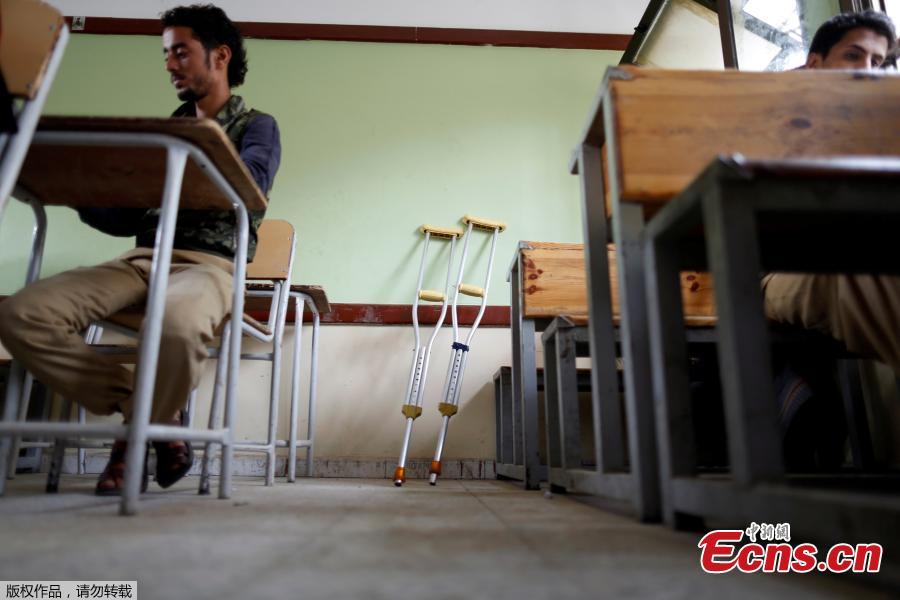 Crutches are seen in a classroom where students are taking their final term exam of high school in Sanaa, Yemen, June 30, 2018. (Photo/Agencies)