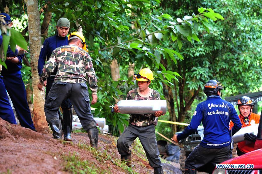 Rescuers search for the 12 teenagers and their football coach who went missing in Mae Sai, Chiang Rai province, in northern Thailand, July 2, 2018. Twelve teenagers and their football coach, trapped in a cave in northern Thailand for nine days, have been found alive on Monday night, Narongsak Osottanakorn, governor of Chiang Rai province said. (Xinhua/Rachen Sageamsak)