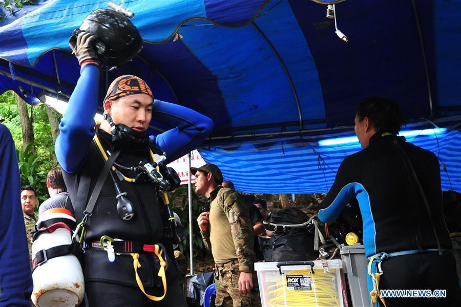 Chinese rescue team members are seen after diving near a cave complex where 12 boys and their soccer coach went missing in Chiang Rai province, in northern Thailand, July 2, 2018. The team of 12 young footballers and their coach were missing in the cave since June 23. (Xinhua/Han Chen)
