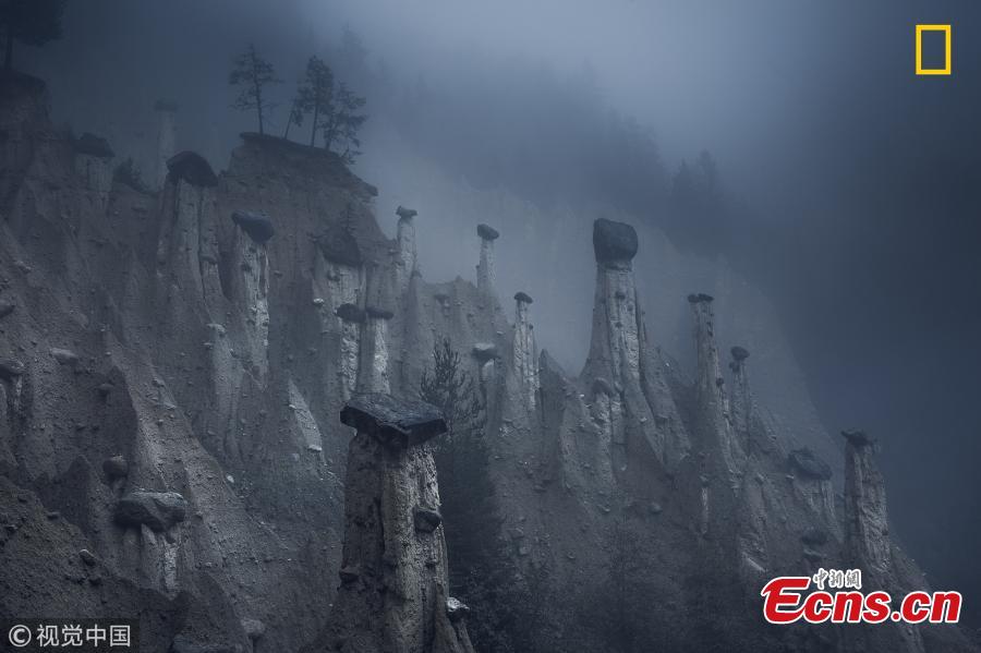 “Mars” by Marco Grassi. These natural sand towers, capped with large stones, are known as the Earth Pyramids of Platten. They are situated in Northern Italy’s South Tyrol region. Formed centuries ago after several storms and landslides, these land formations look like a landscape from outer space and continuously change over the years and, more accurately, over seasons. This natural phenomenon is the result of continuous alternation between periods of torrential rain and drought, which have caused the erosion of the terrain and the formation of these pinnacles. (Photo/VCG)