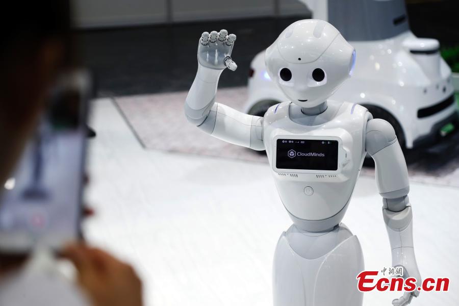 Robots on display at the CIROS2018 (China International Robot Show) in Shanghai, July 4, 2018. More than 500 companies from 13 countries and regions showcased various robot products and services. (Photo: China News Service/Tang Yanjun)
