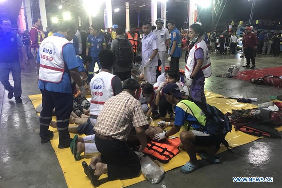 Rescued tourists receive medical treatment on the island of Phuket, Thailand, July 5, 2018. Until 8:30 p.m. local time (1330 GMT) Thursday, the majority of 133 passengers on two boats overturned by rough seas in southern Thailand were saved, but the Thai authority cannot confirm all of them are saved now, said Chinese Consulate-General in Songkhla on Thursday.(Xinhua)