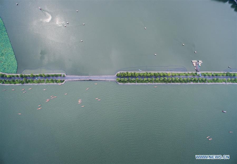Aerial photo taken on July 6, 2018 shows the summer scenery of the West Lake in Hangzhou, east China\'s Zhejiang Province. (Xinhua/Xu Yu)