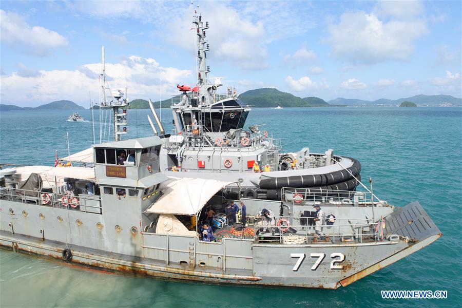 A Thai navy vessel departs to search for missing passengers from the capsized boat in Phuket, Thailand, July 8, 2018. At least 42 people were confirmed dead and 14 others still missing after two boats capsized in a storm off southern Thailand\'s Phuket island, Thai officials said on Saturday. (Xinhua/Qin Qing)