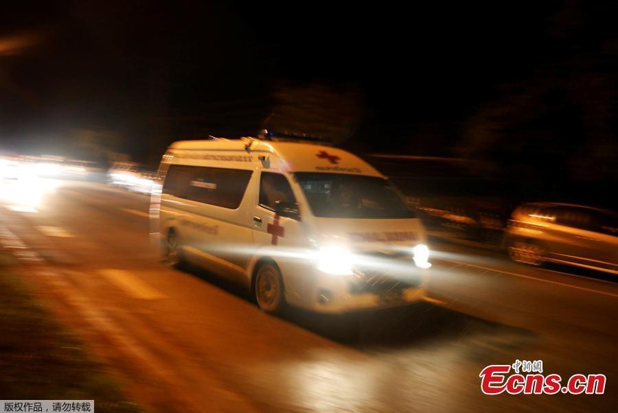 An ambulance believed to be carrying rescued schoolboys travels to a military helipad near Tham Luang cave complex in the northern province of Chiang Rai, Thailand, July 8, 2018. Four boys have exited a flooded cave in northern Thailand where they have been trapped for more than two weeks, a senior member of rescue operation’s medical team said on Sunday. (Photo/Agencies)