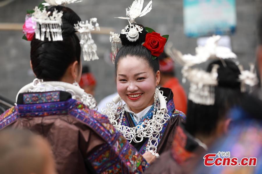 Miao people celebrate the dragon boat festival in Qingshui River, Taijiang County, Southwest China’s Guizhou Province, July 8, 2018. The dragon boat of the Miao is rather special. It is commonly made from a large fir or phoenix tree. Before the contest, villagers will offer chicken and duck to pray for luck and prosperity. The local festival was recognized as a national intangible cultural heritage in 2008. (Photo: China News Service/Huang Xiaohai)