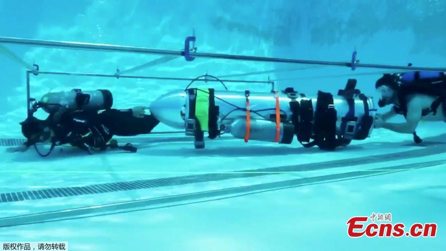 Elon Musk, the billionaire inventor and SpaceX founder, tweeted videos of his rescue submarine that can be used to extract a soccer team trapped inside a Thailand cave. The picture shows the tiny kid-sized submarine simulating maneuvering through a narrow passage. (Photo/Agencies)