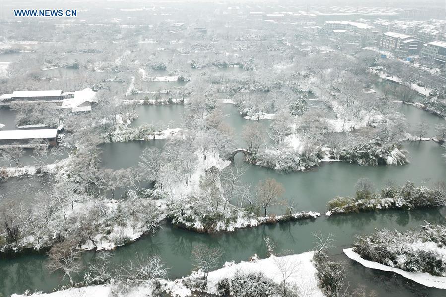 Aerial photo taken on Jan. 28, 2018 shows winter scenery of the Xixi wetland in Hangzhou, east China\'s Zhejiang Province. China, with a total wetland area of 53.6 million hectares, ranks first in Asia and fourth in the world, official data showed. The statistics were released by the National Forestry and Grassland Administration at the Eco Forum Global Annual Conference held in southwest China\'s Guizhou Province. China has 57 wetlands that are of international importance, 602 wetland nature reserves and 898 national wetland parks, according to the administration. In the country\'s wetland ecosystem, there are 4,220 species of plant and 2,312 species of animals, with the wetland protection rate reaching 49 percent, the statistics showed.(Xinhua/Huang Zongzhi)