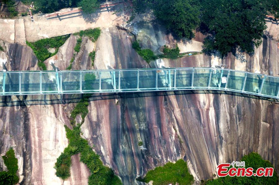 An aerial view of a waterslide over the Xiangma River in Lushan County, Central China’s Henan Province, July 9, 2018. The 2.3-kilometer-long waterside under construction around a mountain slope and cliff has a vertical drop of 100 meters, earning it the title of the longest and most challenging waterslide in central China. (Photo: China News Service/Dong Fei)