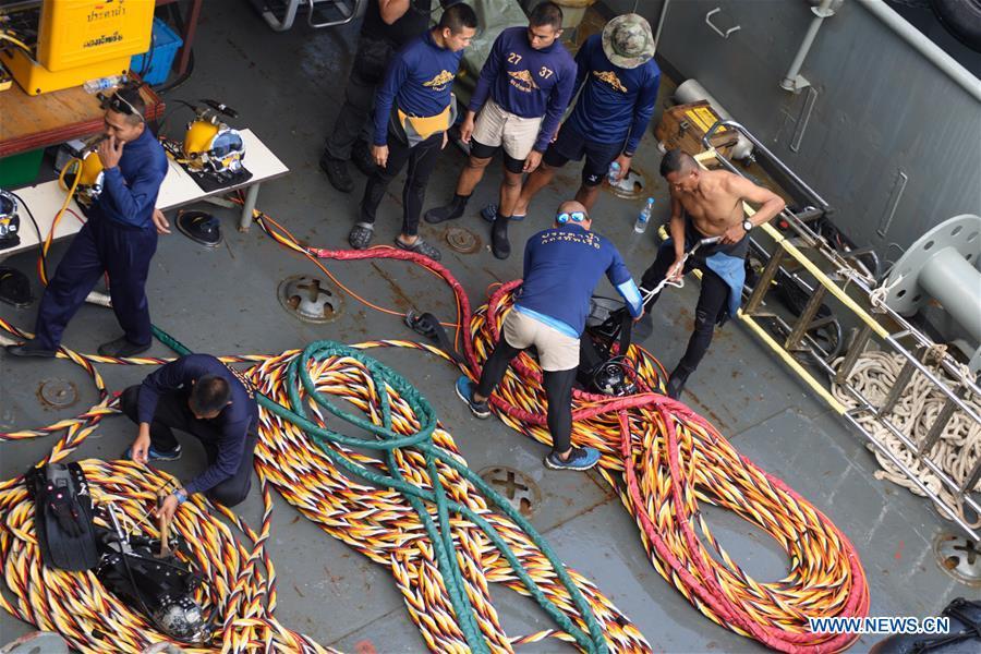 Members of Thai rescue team prepare to search for missing passengers from the capsized boat in the accident area in Phuket, Thailand, July 8, 2018. At least 42 people were confirmed dead and 14 others still missing after two boats capsized in a storm off southern Thailand\'s Phuket island, Thai officials said on Saturday. (Xinhua/Qin Qing)