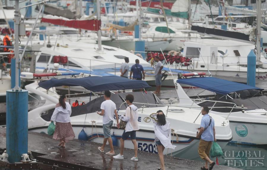 Tourists are seen at a pier in Phuket. (Photo: Cui Meng/GT)