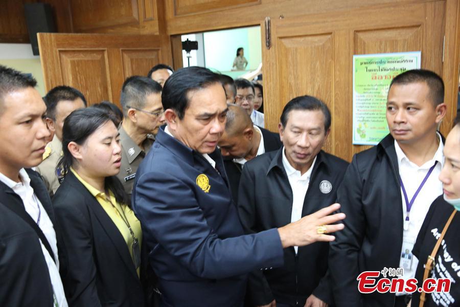 Thai Prime Minister Prayut Chan-o-cha visits the command center for rescue operations in the Phuket boat accident, at Chalong Pier in the tourist attraction island of Phuket, July 9, 2018. He later visited Chinese survivors in local hospitals, expressed his condolence to the victims and pledged to make all-out rescue efforts. (Photo: China News Service/Wang Gang)