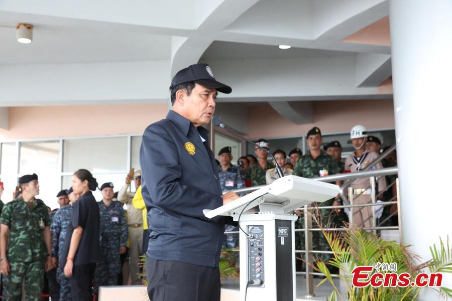 Thai Prime Minister Prayut Chan-o-cha holds a press conference at the command center for rescue operations in the Phuket boat accident, at Chalong Pier in the tourist attraction island of Phuket, July 9, 2018. He later visited Chinese survivors in local hospitals, expressed his condolence to the victims and pledged to make all-out rescue efforts. (Photo: China News Service/Wang Gang)