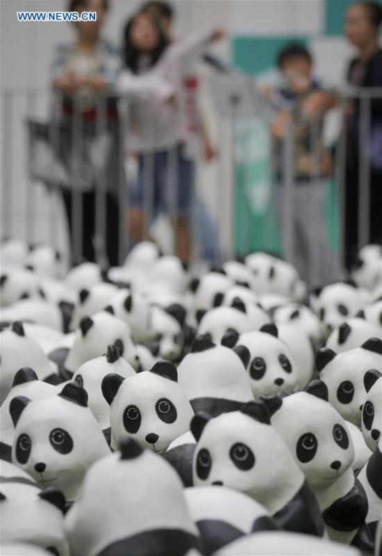 Photo taken on July 10, 2018 shows papier-mache pandas during an exhibition of the papier-mache artwork \