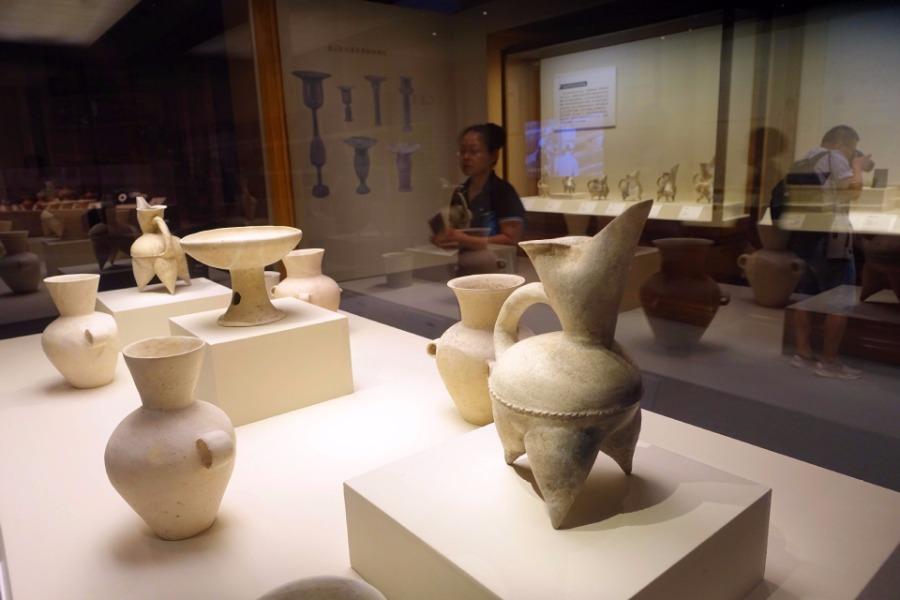 An exhibition featuring Jiaojia relics was unveiled at the National Museum of China on July 10. The exhibition consists of over 230 artifacts, most of which come from the Zhangqiu Jiaojia ruins in Shandong Province. The heritage site was listed as a top 10 archaeological discovery in China in 2017. (Photo/Xinhua)

Covering an area of nearly 150,000 square meters, the relics reveal an extremely rich cultural heritage, including rammed earth walls, ditches, 215 tombs, 116 house sites as well as burial objects such as jade bracelets, pottery cups, white pottery and painted pottery.

The Jiaojia relics site is a link between the preceding Xihe culture of the middle Neolithic Age and the subsequent Longshan and Yueshi cultures. The unearthing filled a gap in the study of residential patterns in the middle and late stage of Dawenkou culture.