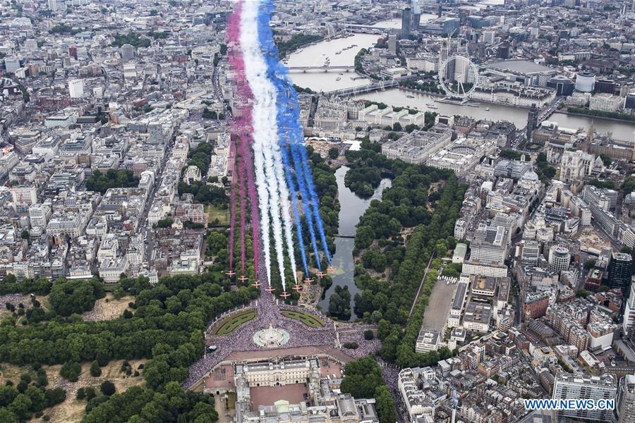 The Red Arrows fly over central London during a celebration to mark the 100th anniversary of the Royal Air Force (RAF) in London, Britain on July 10, 2018. (Xinhua/Britain\'s Ministry of Defence)