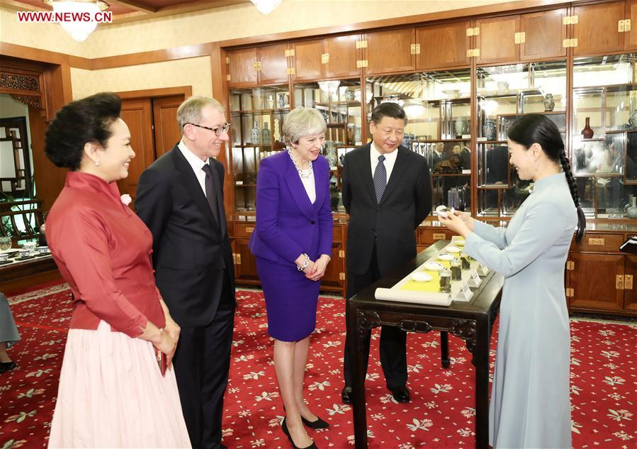 Feb. 1, 2018 

President Xi Jinping and his wife Peng Liyuan, and visiting British Prime Minister Theresa May and her husband Philip May, have afternoon tea in Beijing.  (Photo/Xinhua)